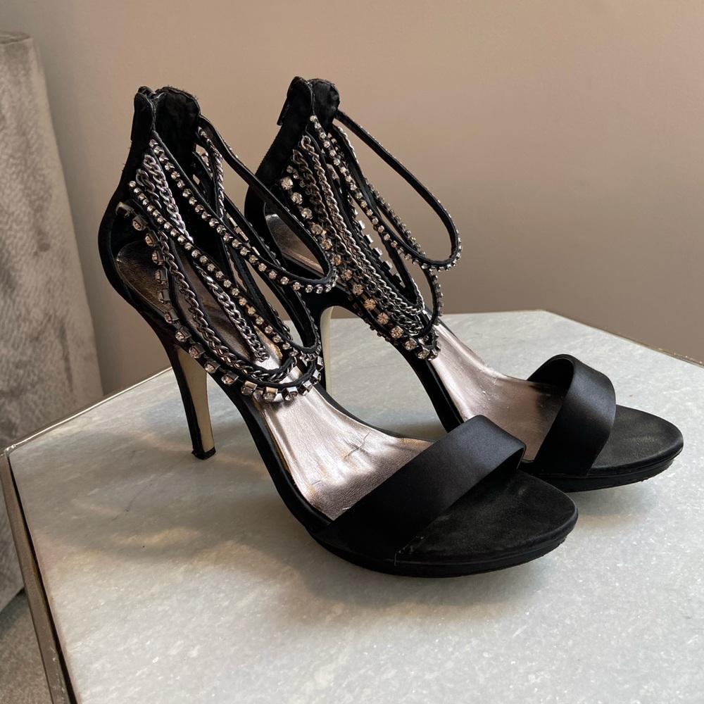 Fun black heels with strappy metal anklet accents